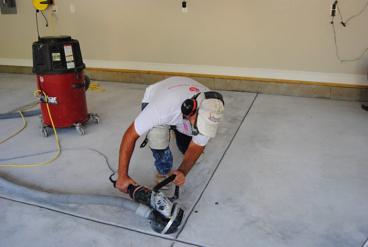 Contractor working on a garage floor