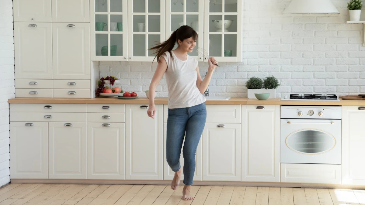 Woman dancing in redone kitchen