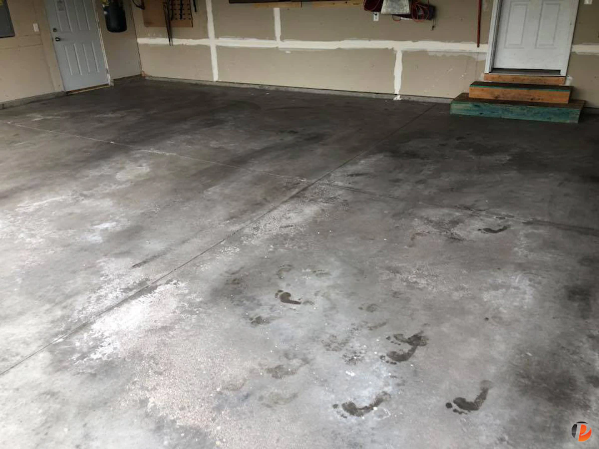 Garage floor being installed.