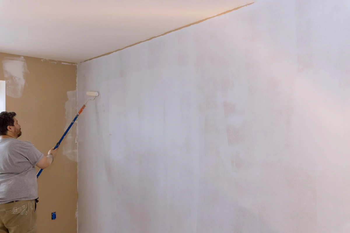 Anderson Painting contractor priming walls